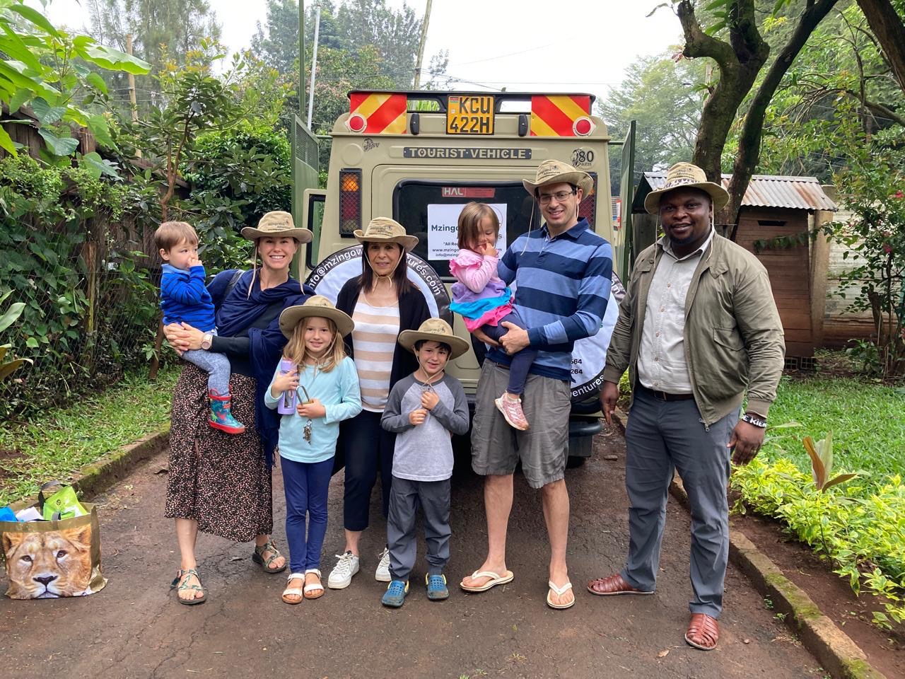 A family with their Mzingo guide
