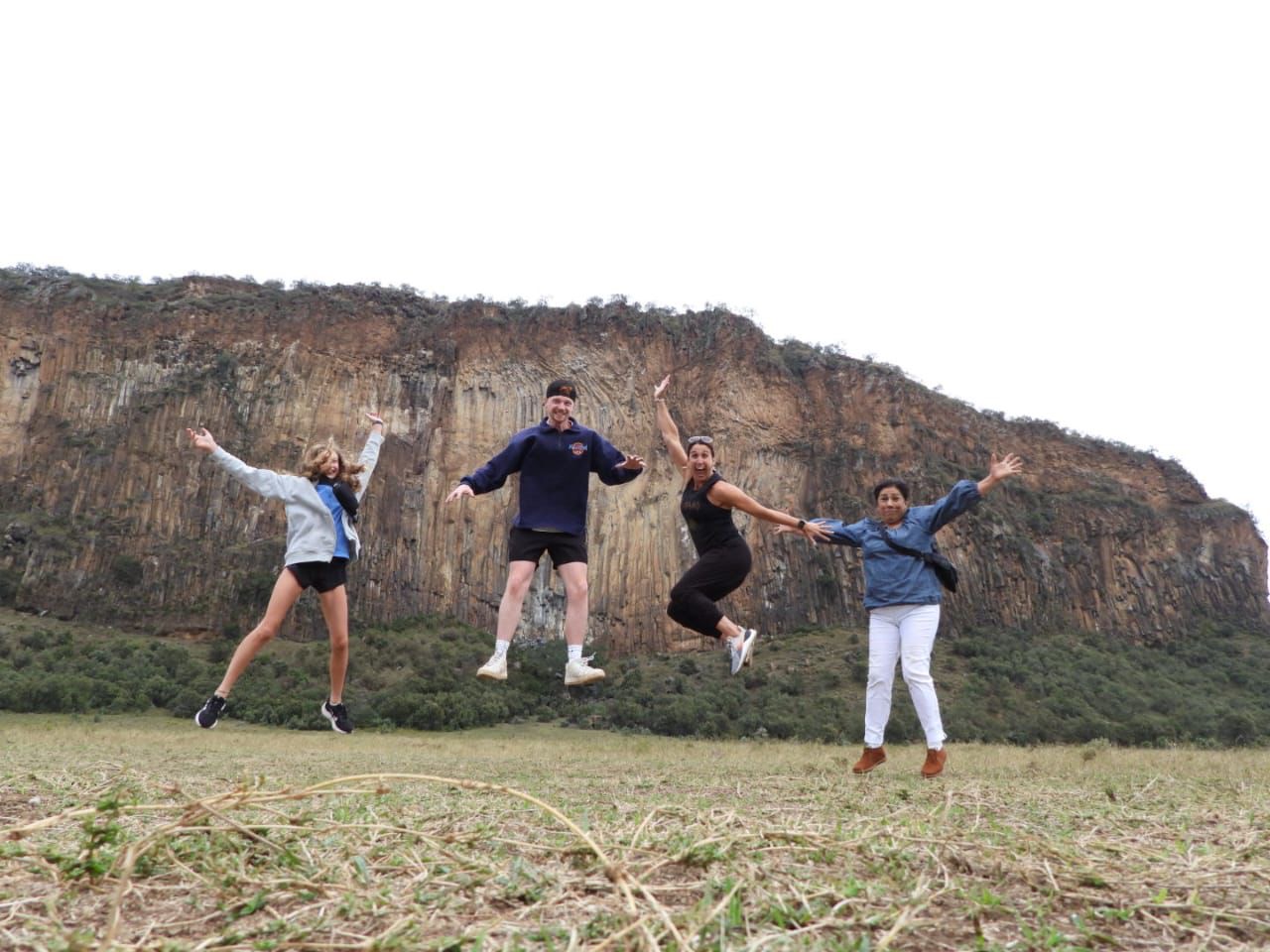 Guests leaping at the cliffs of Hell's Gate National Park
