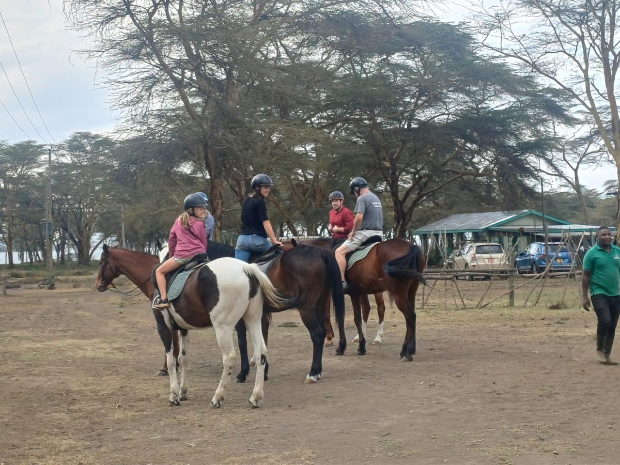 Guests horseback riding near Lake Naivasha
